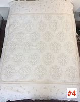 Top view of the Lenox queen size bed quilt, showing full embroidery pattern and overall condition.