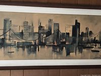 Frontal view of the framed Metropolitan Scene print with cityscape and bridge.