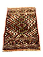 Full view of the Persian Gabbeh rug laid out flat showing the chessboard and geometric pattern design with fringed edges.