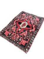 Full view of the Bakhtiar rug showing overall pattern and coloration.