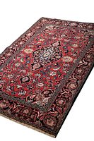 Angled view showing overall design, pile texture and condition.