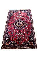 Full top-down view showing entire rug pattern, border and field color