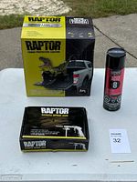 Main image showing the Raptor coating box, the Schutz spray gun box, and the UPOL Acid 8 aerosol can on a white table.