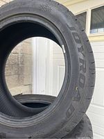 Photo showing sidewall branding of Joyroad and winter snowflake symbol on tire.