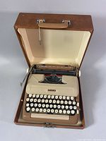 Eaton’s Prestige typewriter inside open hard carrying case