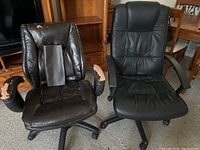 Photo showing two black leather office chairs side by side; left chair with heavy peeling on armrests and seat edges and extra leather repair material attached; right chair with better overall condition.
