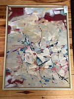 Full view of abstract painting in gold-toned metal frame