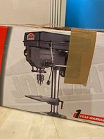 Photo of the JobMate bench drill press box showing the product image and branding on the side of the box.