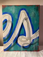 Front view of original painting by Andrew Horne depicting the stylized letter S resembling a neon sign on an 11x14 canvas.