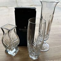 Three Waterford Crystal vases displayed with branded box visible