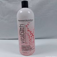 Full front view of the Vitabath Pomegranate Bellini Blush product bottle showing branding and volume.