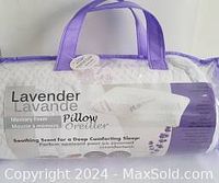 Photo of the pillow packaging showing Lavender Luxury Pillow with memory foam and scent details.