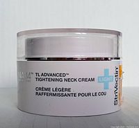 Front view of the StriVectin TL Advanced Tightening Neck Cream Light jar showing product name and technology