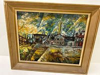 Frontal view of the oil painting in its gold-tone frame showing the full industrial scene.