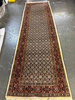 Full length shot of runner rug on concrete floor