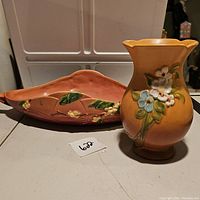 Photo showing both Roseville Snowberry console bowl and Weller vase together on table.