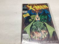 Front cover of Uncanny X-Men #241 comic book in plastic protective sleeve showing the cover art featuring the Goblin Queen and other characters.