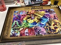 Ravensburger 1000 piece Marvel Villainous puzzle featuring Thanos character and others.