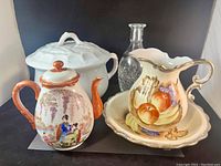 Royal Ironstone China chamber pot, tea pot with chip on lid, decorative wash basin and bowl, and London Winery Limited glass bottle