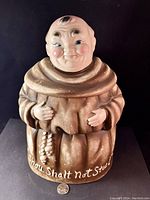 Front view of the Friar Tuck cookie jar showing full figure and inscription 'Thou Shalt Not Steal'