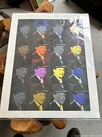 Full view of the pop art print showing 15 portraits of Frank Sinatra in varying colors, bordered by white margins.