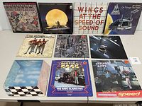 Photo showing front covers of ten vinyl records by various artists