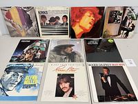 Front view of album covers displayed in two rows showing 10 classic vinyl record albums by various artists