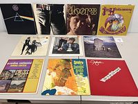 Front covers of ten vinyl records arranged in two rows