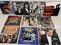 Front view showing vinyl records from various classic rock and pop artists with visible album covers.