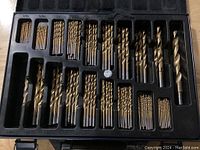 Photo displays an organized set of various sizes of Mastercraft drill bits in a black plastic case with dedicated slots for each size.