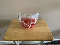 Front view of vintage Murano glass dish showing ruffled edge and color layers