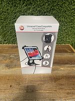 Front view of CTA Universal Case-Compatible Security Kiosk Stand packaging showing tablet model fitted and features.