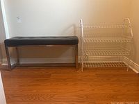 Bench and shoe rack placed side by side against the wall on wooden floor, showing overall condition and appearance