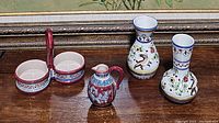 View of all 4 ceramic decor pieces: 2 hand painted Portuguese vases, small pitcher, and dual compartment dish with handle