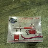 Box showing Paasche Airbrush Set with image of airbrush and hose.