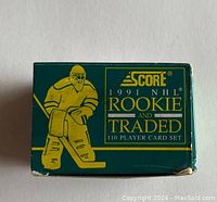 Front image of the green box featuring gold hockey goalie outline and text Score 1991 NHL Rookie and Traded 110 Player Card Set.