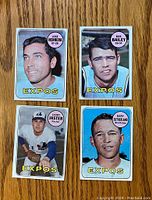 Front side of four 1969 Topps Montreal Expos baseball cards showing portraits of Jose Herrera, Bob Bailey, Larry Jaster, and Gary Sutherland.