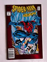 Front cover image showing Spider-Man 2099 in blue and red costume swinging through a city with webbing in the background.