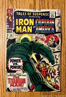 Front cover of the comic book showing the title Tales of Suspense featuring Iron Man and Captain America, issue #93 with cover price 12 cents, depicting Iron Man fighting the Titanium Man.