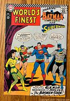 Front cover of World's Finest Comics #164 featuring Batman, Superman, Robin, and a female character with comic text bubbles.