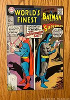 Front cover of World's Finest Comics #171 showing Superman and Batman reading an Executioner's List.