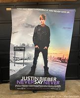 Full view of the Justin Bieber Never Say Never movie theatre banner showing the full image and text.