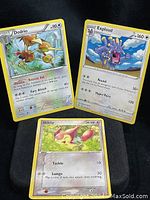 Three Pokémon trading cards Dodrio, Exploud, Skitty, front view showing artwork and text details.