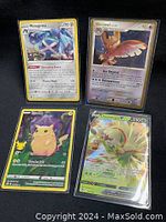Shows all four Pokémon cards: Metagross, Noctowl, Pikachu, Chesnaught V, all holographic and in sleeves.