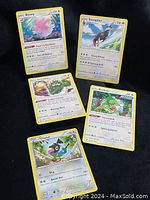 Five Pokémon cards displayed against black background: Blissey, Staraptor, Turtwig, Kecleon, Chatot