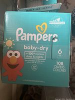 Box of Pampers Baby-Dry Size 6 with Elmo character, sealed, 108 diapers