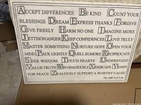 Rectangular stone plaque engraved with an ABCs positive sayings text.