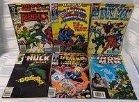 Six Marvel 'What If' comic books laid out, showing front covers with various superheroes and storylines.