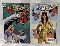 Shows both comic books side by side, front covers visible