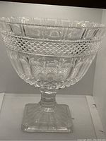 Full view of the crystal serving bowl showing the cut glass design and square base.